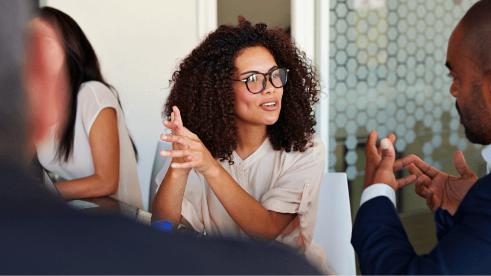 business woman with glasses in a meeting